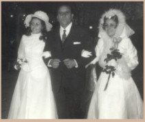 Clina y Adriana Polloni con su padre